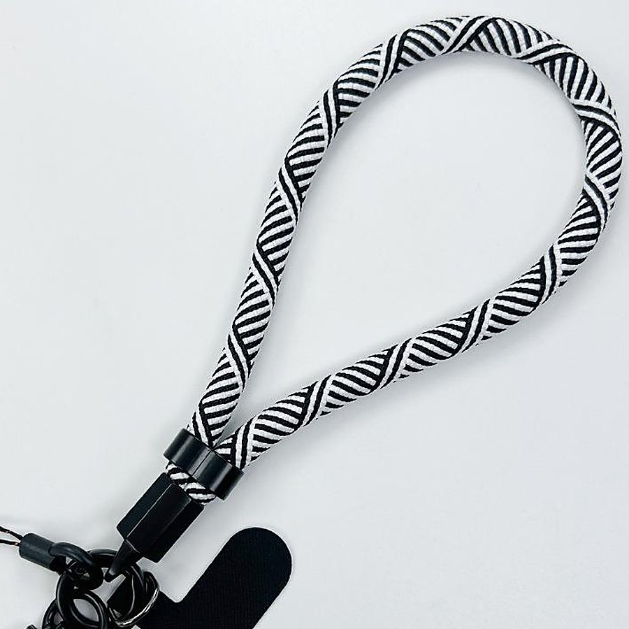Macro detail of the tight braided polyester weave on the wrist strap